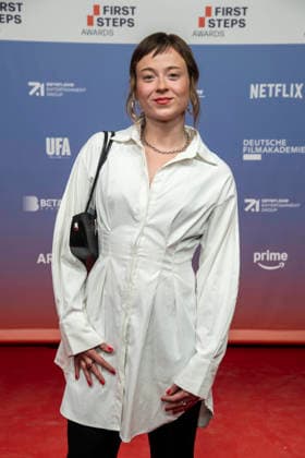 ABB FIRSTSTEPS: Linda Belinda Podszus walks the red carpet at the 2026 FIRST STEPS Awards ceremony at the Theater des Westens on October 5, 2026, in Berlin, Germany