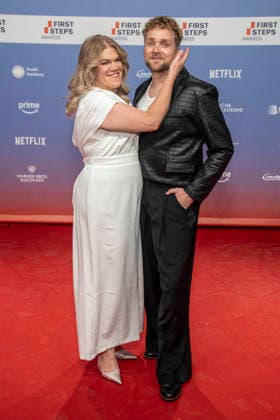 ABB FIRSTSTEPS: Gisa Flake and Knud Riepen walk the red carpet at the 2026 FIRST STEPS Awards ceremony at the Theater des Westens on October 5, 2026, in Berlin, Germany