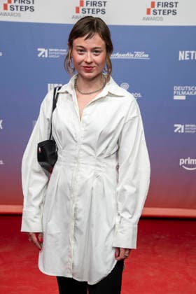 ABB FIRSTSTEPS: Linda Belinda Podszus walks the red carpet at the 2026 FIRST STEPS Awards ceremony at the Theater des Westens on October 5, 2026, in Berlin, Germany