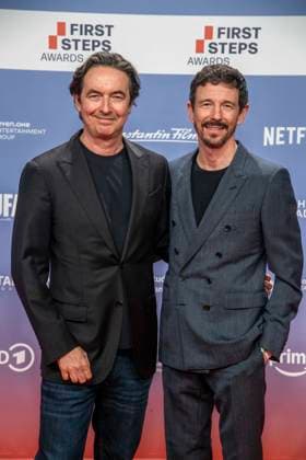 ABB FIRSTSTEPS: Martin Bachmann and Oliver Berben on the red carpet at the 2026 FIRST STEPS Awards ceremony at the Theater des Westens on October 5, 2026, in Berlin, Germany