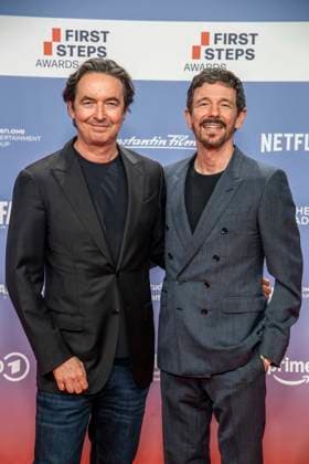 ABB FIRSTSTEPS: Martin Bachmann and Oliver Berben on the red carpet at the 2026 FIRST STEPS Awards ceremony at the Theater des Westens on October 5, 2026, in Berlin, Germany