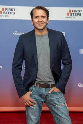 ABB FIRSTSTEPS: Pierre Kiwitt walks the red carpet at the 2026 FIRST STEPS Awards ceremony at the Theater des Westens on October 5, 2026, in Berlin, Germany