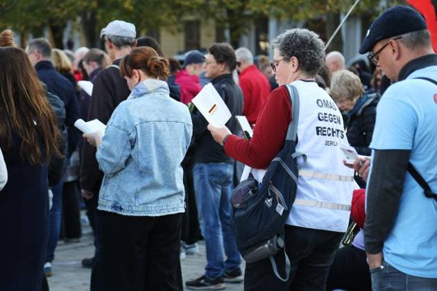Magdeburg, Saxony-Anhalt, Germany, October 6, 2026: Inaugural session of the state parliament. On Domplatz, demonstrators stand in front of the state parliament building to protest against the AfD and read aloud from the Basic Law. Copyright: xdtsxNachrichtenagenturx dts_137263