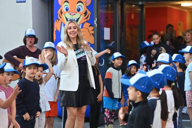 Anna STOLZ, Minister of State for Education and Culture, with students, Markus SOEDER, Minister-President of Bavaria and CSU Chairman, visited the Sport Elementary School on Margarethe Danzi Street in Munich on October 6, 2026, together with Health Minister Judith Gerlach and Minist