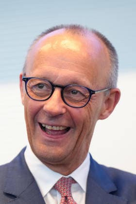 Opening shots of the CDU parliamentary group meeting: Chancellor Friedrich Merz of the CDU is pictured with a joyful expression at the start of the parliamentary group meeting of the CDU CSU parliamentary group in the German Bundestag, Berlin, October 6, 2026, Berlin, Berlin, Germany
