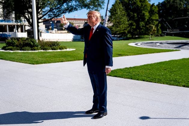 President Donald Trump waves to Gold Star Families before boarding Marine One on the South Lawn of the White House in Washington, DC on Tuesday, October 6, 2026. The President is going to Baltimore, Maryland to deliver remarks at Anduril Industries, a tech company that builds robotic weapons and software for the military. WAP20261006318 BONNIExCASH