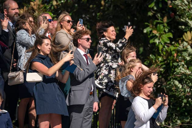 October 6, 2026, Washington, District Of Columbia, USA: Gold Star Families film as Marine One, with United States President Donald J Trump on board departs the South Lawn of the White House in Washington, DC, USA, on Tuesday, October 6, 2026. The President is going to Baltimore, Maryland to deliver remarks at Anduril Industries, a tech company that builds robotic weapons and software for the military Washington USA - ZUMAs152 20261006_faa_s152_006 Copyright: xBonniexCashx-xPoolxviaxCNPx