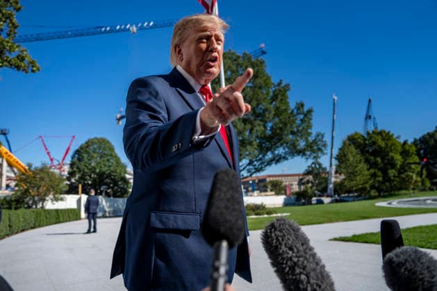October 6, 2026, Washington, District Of Columbia, USA: United States President Donald J Trump speaks with reporters before boarding Marine One on the South Lawn of the White House in Washington, DC, USA, on Tuesday, October 6, 2026. The President is going to Baltimore, Maryland to deliver remarks at Anduril Industries, a tech company that builds robotic weapons and software for the military Washington USA - ZUMAs152 20261006_faa_s152_010 Copyright: xBonniexCashx-xPoolxviaxCNPx