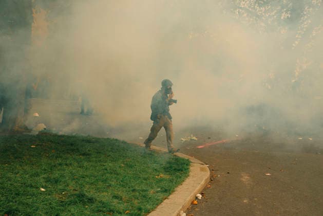 Paris Students Protest Education Conditions A demonstrator moves through dense tear gas along the edge of a grassy area in Paris, France, on October 6, 2026. France s Interior Ministry said 256,000 people marched nationwide, including 56,000 in Paris, during the student-led day of action over school conditions. High school students called for more education funding and staff, smaller classes and improved facilities, with teachers, parents and unions joining demonstrations. Paris Ile de France France Copyright: xDavoodxMaeilix