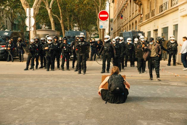 Paris Students Protest Education Conditions A seated demonstrator faces a line of riot police blocking a street in Paris, France, on October 6, 2026. France s Interior Ministry said 256,000 people marched nationwide, including 56,000 in Paris, during the student-led day of action over school conditions. High school students called for more education funding and staff, smaller classes and improved facilities, with teachers, parents and unions joining demonstrations. Paris Ile de France France Copyright: xDavoodxMaeilix