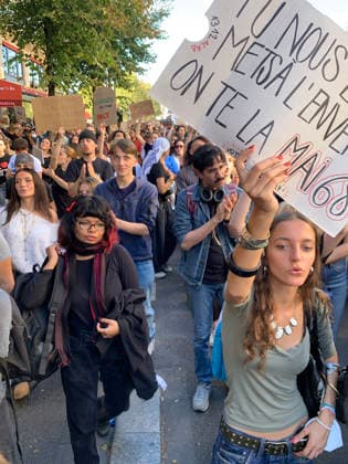High school students hold placards as they demonstrate in the streets of Paris on Tuesday, October 6, 2026. Hundreds of thousands of students and their supporters took part in nationwide protests across France today to protest school conditions.  PAR20261006118 MAYAxVIDON-WHITE