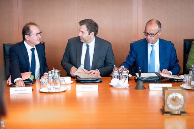 61st Meeting of the Federal Cabinet – Latest News, October 7, 2026, Berlin: Federal Chancellor Friedrich Merz (CDU), Lars Klingbeil, Federal Minister of Finance and Vice Chancellor, and Alexander Dobrindt, Federal Minister of the Interior, in conversation at the cabinet table. Ahead of the cabinet meeting, Federal Cabinet meeting at the Federal Chancellery in Berlin, Berlin, Germany