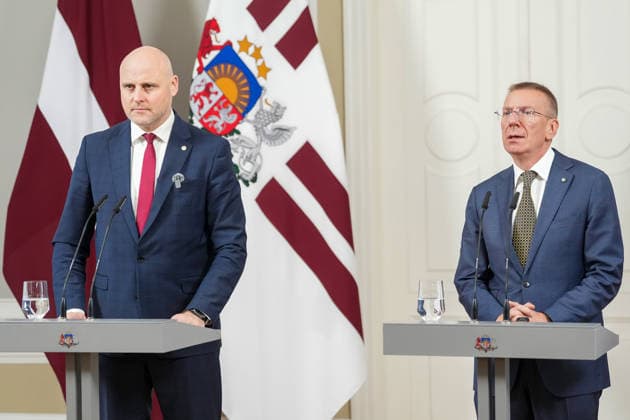 October 7, 2026, Riga, LATVIA: Latvian President EDGARS RINKEVICS (R) and Current Latvian Prime Minister and candidate for Prime Minister of the new government, ANDRIS KULBERGS attend the delivery of a statement by Latvian President in Riga, Latvia, 07 October 2026. Riga LATVIA  - ZUMAp305 20261007_zip_p305_006 Copyright: xEdijsxPalensx