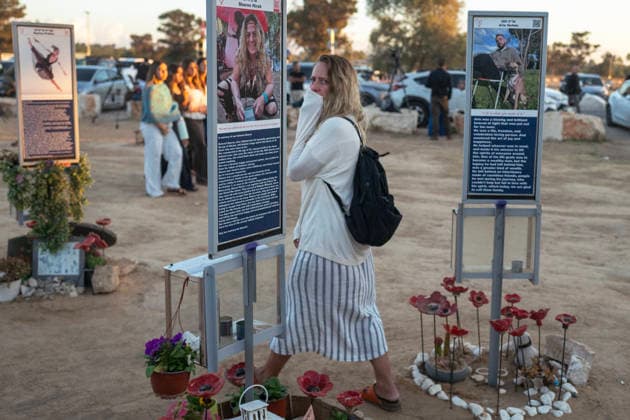 Israelis mourn at sunrise in the Re im memorial on the third anniversary where Hamas massacred 364 people and took another 40 hostages during the Nova dance party on October 7, 2023, near Kibbutz Re im, southern Israel on Wednesday, October 7, 2026. The Hamas cross-border attacks resulted in the deaths of approximately 1,200 people and the abduction of 251 hostages. ISR2026060800231 JimxHollander