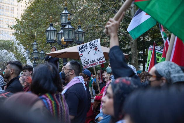 October 7, 2026, New York, New York, USA: Palestinian flags wave above demonstrators during a pro-Palestinian rally at City Hall Park in New York City, New York. New York USA  - ZUMAs237 20261007_aap_s237_003 Copyright: xMarkxJ.xSullivanx