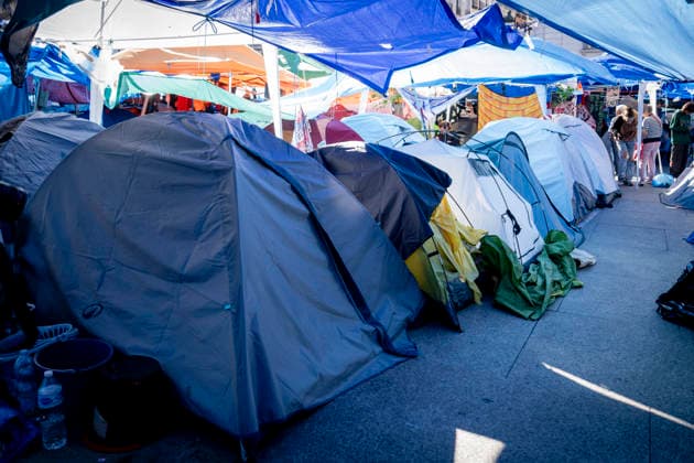 Protesters at Sol Square Stand by Their Demands for Housing Housing Protest at Puerta del Sol, October 8, 2026, in Madrid, Spain. The encampment at Sol has spilled over into the square, and the protesters are maintaining their demands against evictions and exorbitant rents. The Official State Gazette (BOE) published yesterday, October 7, the new version of the housing and rent decrees that the Council of Ministers approved the previous day OCTOBER 8, 2026 A Pé Madrid, Madrid, Spain  Copyright: xA.xPÃ rezxMecax 7828155