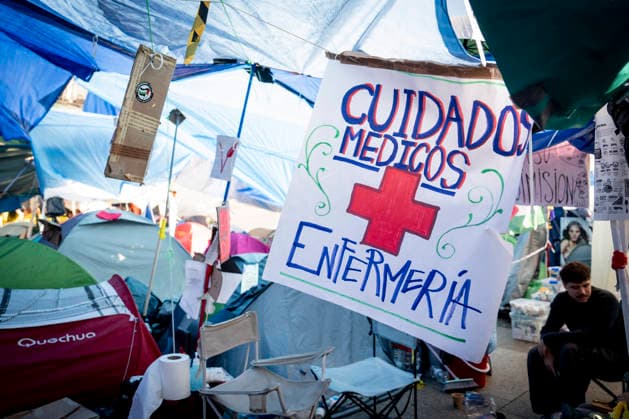 Protesters at Sol Square maintain their demands regarding housing. A banner reading Medical care, nursing during the housing protest at Puerta del Sol on October 8, 2026, in Madrid, Spain. The encampment at Sol has spilled over into the square, and the protesters are maintaining their demands against evictions and exorbitant rents. The Official State Gazette (BOE) published yesterday, October 7, the new version of the housing and rent decrees that the Council of Ministers had approved the previous day OCTOBER 8, 2026 A Pé Madrid, Madrid, Spain  Copyright: xA.xPÃ rezxMecax 7828163