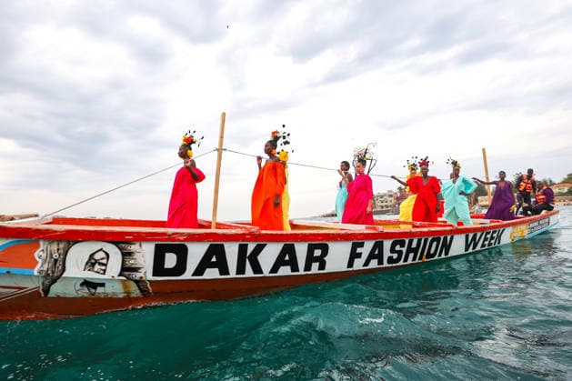 Dakar Fashion Week, fashion show by Adama Paris on fishing boats