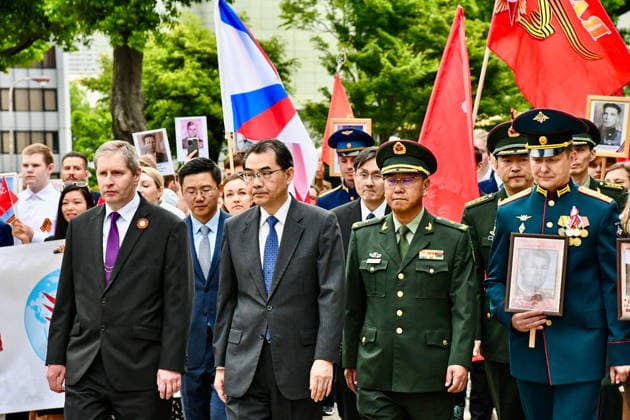 Japan, Russian and Chinese ambassadors take part in march before Victory Day in Tokyo