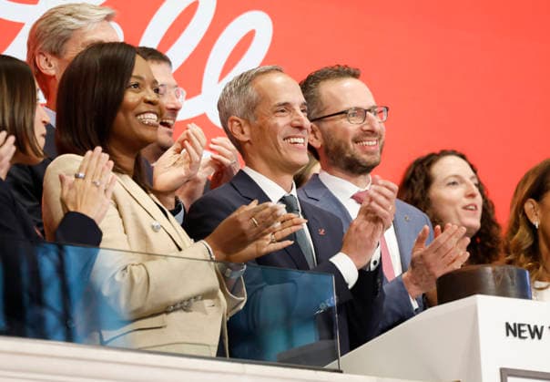 USA, Vice Chairman and Board of Directors of Eli Lilly and Co ring the opening bell of the New York Stock Exchange