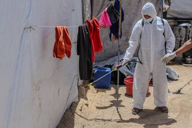 Middle East conflict, Gaza, Mosquito control campaign at Sheikh Radwan Pond in Gaza City