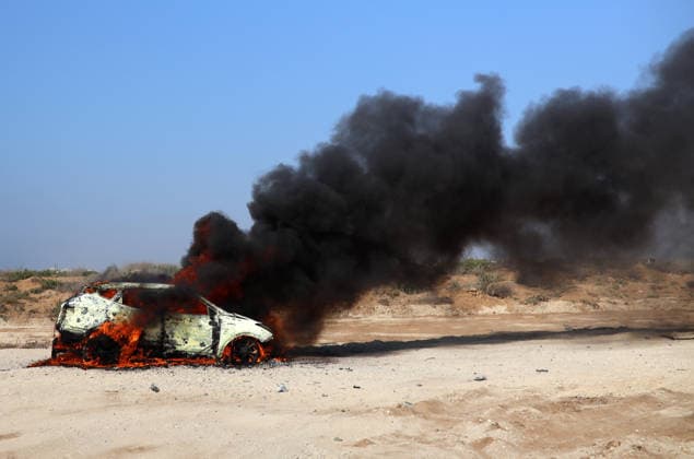 Middle East conflict, Gaza: Car on fire following Israeli air strike in Gaza City