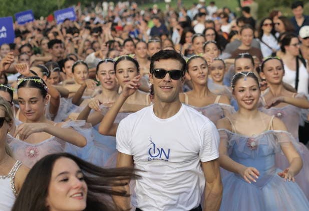 Celebrity: Roberto Bolle leads a group dance performance in Milan