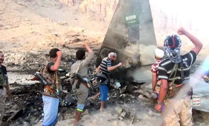 Yemen: Houthis inspect the wreckage of a Saudi Arabian F-15 fighter jet in Marib Province