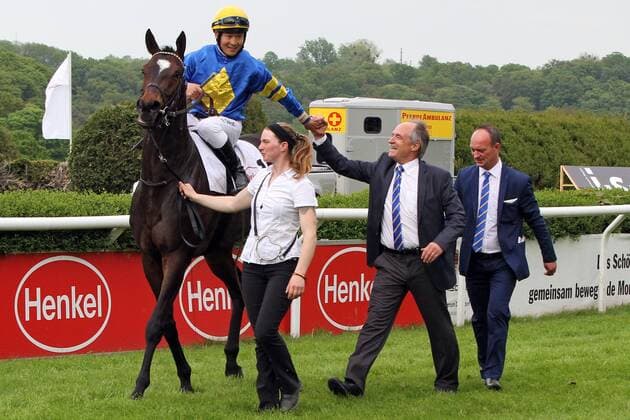 29 04 2018 Duesseldorf North Rhine Westphalia GER Wonnemond with Bayarsaikhan Ganbat Owners Klaus Wilhelm and Coach Sascha Smrczek right after the victory Galopprennbahn Duesseldorf Grafenberg Horse Jockey Wonnemond Ganbat Victory Coach Owner Wilhelm Smrczek 180429S953DUESSELDORF JPG