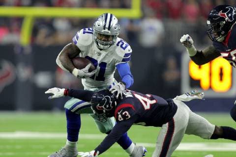 October 7, 2018 - Houston, Texas, U.S - Dallas Cowboys running back Ezekiel Elliott (21) is tackled low by Houston Texans cornerback Shareece Wright (43) on a running play during the first quarter of the NFL American Football Herren USA regular season game between the Houston Texans and the Dallas Cowboys at NRG Stadium in Houston, TX on October 7, 2018 NFL 2018 - Dallas Cowboys vs Houston Texans OCT 07 - ZUMAw137 20181007_zap_w137_036 Copyright: xErikxWilliamsx