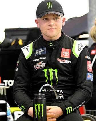LAS VEGAS, NV - OCTOBER 14: Ty Gibbs ( 54 Joe Gibbs Racing Toyota Monster Energy) sits on the pit wall prior to qualifying for the NASCAR, Motorsport, USA Xfinity Series Alsco Uniforms 302 ON October 14, 2022, at Las Vegas Motor Speedway in Las Vegas, Nevada. (Photo by Will Lester Icon Sportswire) AUTO: OCT 14 NASCAR Xfinity Series Playoff Alsco Uniforms 302 Icon2210140850