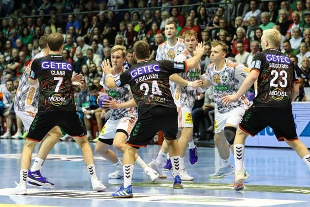 Marian Michalczik TSV Hannover Burgdorf,22 with Jonathan Edvardsson TSV Hannover Burgdorf,26 and Justus Fischer TSV Hannover Burgdorf,54 against Felix Claar SC Magdeburg,7 ,Christian O Sullivan SC Magdeburg,24 ,Magnus Saugstrup SC Magdeburg,23 Handball Bundesliga Season 2023 2024 SC Magdeburg vs TSV Hannover Burgdorf at GETEC Arena in Magdeburg Action,Handball,Germany,15 10 2023