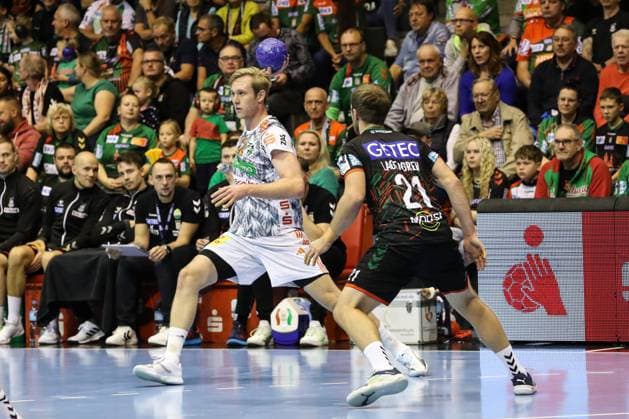 Marian Michalczik TSV Hannover Burgdorf,22 vs Albin Lagergren SC Magdeburg,21 Handball Bundesliga Season 2023 2024 SC Magdeburg vs TSV Hannover Burgdorf at GETEC Arena in Magdeburg Action,Handball,Germany,15 10 2023