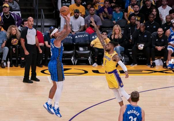 October 30, 2023, Los Angeles, California, USA: Jonathan Isaac 1 of the Los Angeles Lakers tries to block a shot by Paolo Banchero 5 of the Orlando Magic during their regular season game on Tuesday October 31, 2023 at Crypto.com Arena in Los Angeles, California. Lakers defeat Magic, 106-103. BURT HARRIS PI Los Angeles USA - ZUMAp124 20231030_zaa_p124_111 Copyright: xJavierxRojasx