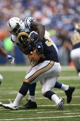 NFL, American Football Herren, USA 2012: Rams vs Colts AUG 12 August 12, 2012: Indianapolis Colts defensive end Jerry Hughes (92) stops St. Louis Rams fullback Ovie Mughelli (34) during an NFL game between the St. Louis Rams and the Indianapolis Colts at Lucas Oil Stadium in Indianapolis, IN. The Colts defeated the Rams by a score of 38-3(Credit Image: Pat Lovell Cal Media) Indianapolis Indiana United States EDITORIAL USE ONLY Copyright: xx ZUMA-20120812_zaf_c04_100.jpg PatxLovellx csmphoto628278