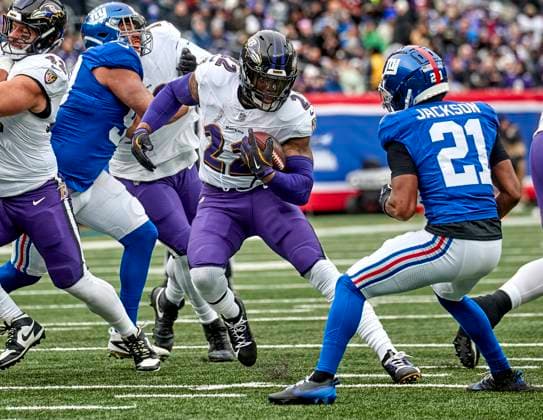 Baltimore Ravens running back Derrick Henry (22) looks for running room against the New York Giants during a NFL, American Football Herren, USA game at MetLife Stadium in East Rutherford, New Jersey. CSM East Rutherford United States - ZUMAc04_ 20241216_zma_c04_015 Copyright: xDuncanxWilliamsx