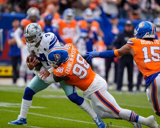 October 26, 2025: Dallas Cowboys quarterback Dak Prescott (4) is sacked by Denver Broncos defensive end John Franklin-Myers (98) win the first half of the football game between the Denver Broncos and Dallas Cowboys. CSM. - ZUMAc04_ 20251026_zma_c04_198 Copyright: xDerekxRegensburgerx