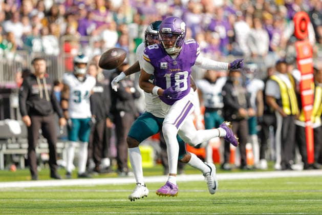 MINNEAPOLIS, MN - OCTOBER 19: Minnesota Vikings wide receiver Justin Jefferson (18) watches an overthrown ball while being defended by Philadelphia Eagles cornerback Quinyon Mitchell (27) during the second half of the NFL, American Football Herren, USA game between the Minnesota Vikings and Philadelphia Eagles on October 19th, 2025, at U.S. Bank Stadium in Minneapolis, MN. (Photo by Bailey Hillesheim Icon Sportswire) NFL: OCT 19 Eagles at Vikings EDITORIAL USE ONLY Icon251019041