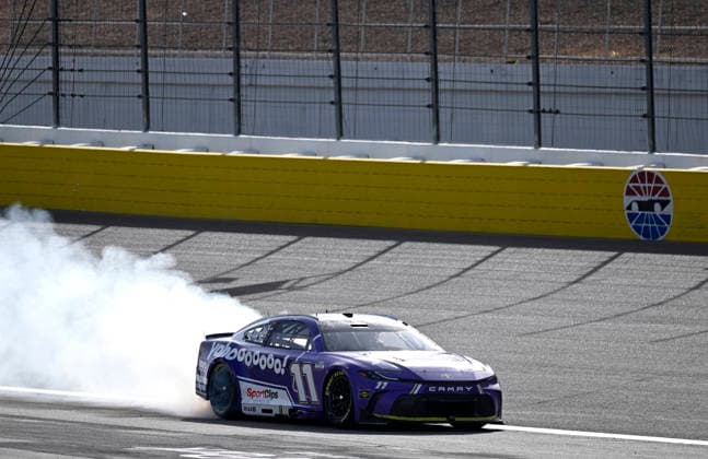 LAS VEGAS, NV - MARCH 15: Denny Hamlin ( 11 Joe Gibbs Racing Yahoo! Toyota) celebrates with a burnout down the front straight after winning the NASCAR, Motorsport, USA Cup Series Pennzoil 400 on March 15, 2026, at Las Vegas Motor Speedway in Las Vegas, NV. (Photo by Will Lester Icon Sportswire) AUTO: MAR 15 NASCAR Cup Series Pennzoil 400 EDITORIAL USE ONLY Icon24031515329