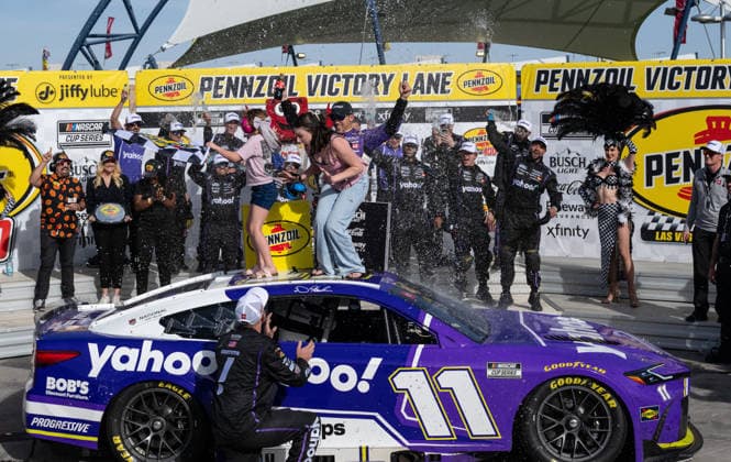 LAS VEGAS, NV - MARCH 15: Denny Hamlin ( 11 Joe Gibbs Racing Yahoo! Toyota) celebrates in victory lane as his daughters stand on the car after winning the NASCAR, Motorsport, USA Cup Series Pennzoil 400 on March 15, 2026, at Las Vegas Motor Speedway in Las Vegas, NV. (Photo by Will Lester Icon Sportswire) AUTO: MAR 15 NASCAR Cup Series Pennzoil 400 EDITORIAL USE ONLY Icon240315158481