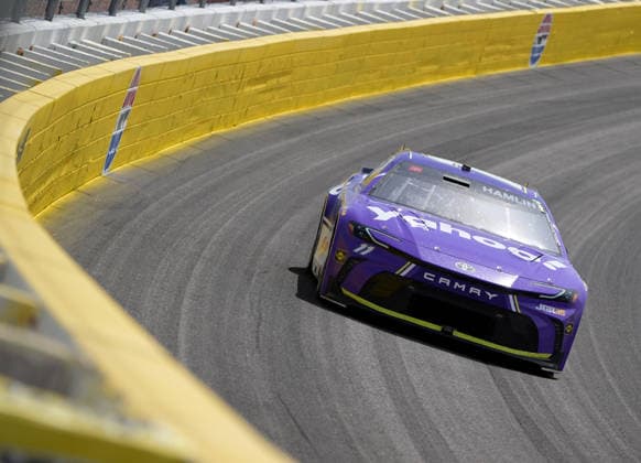 LAS VEGAS, NV - MARCH 15: Denny Hamlin ( 11 Joe Gibbs Racing Yahoo! Toyota) races through turn 3 during the middle laps of the NASCAR, Motorsport, USA Cup Series Pennzoil 400 on March 15, 2026, at Las Vegas Motor Speedway in Las Vegas, NV. (Photo by Will Lester Icon Sportswire) AUTO: MAR 15 NASCAR Cup Series Pennzoil 400 EDITORIAL USE ONLY Icon24031512918