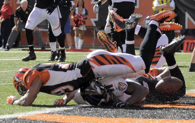Oct. 26, 2014 - Cincinnati, OH, USA - Cincinnati Bengals cornerback Leon Hall (29) lands on top of Baltimore Ravens wide receiver Kamar Aiken (11) as an intended pass bounces in the end zone on fourth down, with Baltimore failing to score any points in the first quarter Sunday, Oct. 26, 2014 at Paul Brown Stadium in Cincinnati, Ohio. The Ravens fell to the Bengals 27-24. Copyright: xKarlxMertonxFerronx