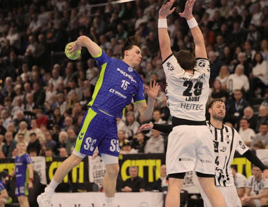 Photo Goal throw from Miro Schluroff Gummersbach against Lukas LAUBE Kiel , right Handball Men 1 Bundesliga on Sat 28 02 2025 THW Kiel VfL Gummersbach