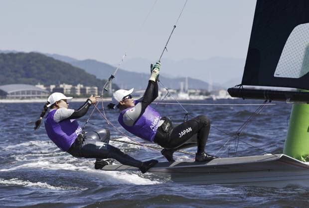 Aichi-Nagoya Asian Games: Sailing Japanese sailors Misaki Tanaka (L) and Sera Nagamatsu compete en route to winning gold in the Aichi-Nagoya Asian Games women s skiff at Kaiyoh Yacht Harbor in Gamagori in Aichi Prefecture, central Japan, on Oct. 1, 2026.  A14AA0005629596P