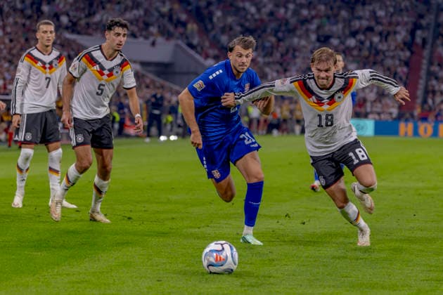 Munich, Germany October 1, 2026 UEFA Nations League 2026–2027 League Phase Group A2 Match 3 Germany vs. Serbia Pictured from left: Lazar Samardzic (SRB) and Maximilian Mittelstädt (GER) in a tackle. DFB and DFL regulations prohibit any use of photographs as image sequences and or quasi-video. Allianz Arena, Bayern Copyright: xFotostandx xSchäferx