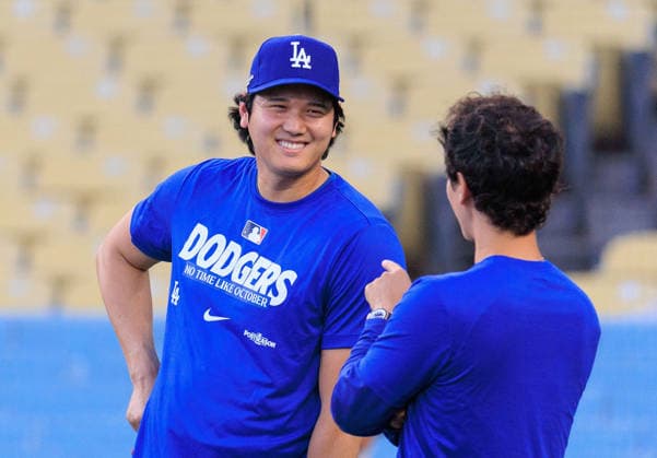 October 2, 2026, Los Angeles, California, USA: Shohei Ohtani 17 of the Los Angeles Dodgers chats with translator, Will Ireton during a workout in preparation for Game 1 of the NLDS against the Atlanta Braves on Friday October 2, 2026 at Dodger Stadium in Los Angeles, California. JAVIER ROJAS PI Dodgers NLDS - Workout - ZUMAp124 20261002_zaa_p124_125 Copyright: xJavierxRojasx