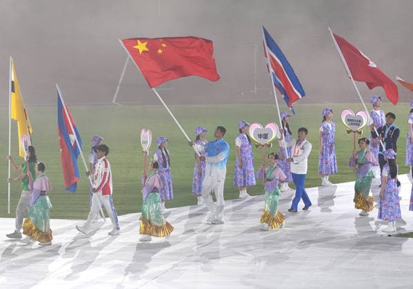 (261004) -- NAGOYA, Oct. 4, 2026 -- Flag-bearer of the delegation of China Bi Kun parades into the stadium during the closing ceremony of the 20th Asian Games Aichi-Nagoya 2026 in Nagoya, Japan, Oct. 4, 2026. ) (SP)JAPAN-NAGOYA-ASIAN GAMES-CLOSING CEREMONY LuoxYuan