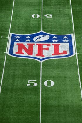 4th October 2026; Tottenham Hotspur Stadium, London, England; NFL, American Football Herren, USA International Series American Football, Washington Commanders versus Indianapolis Colts; A detail view of the NFL shield on the grass HenningxVonxJagow