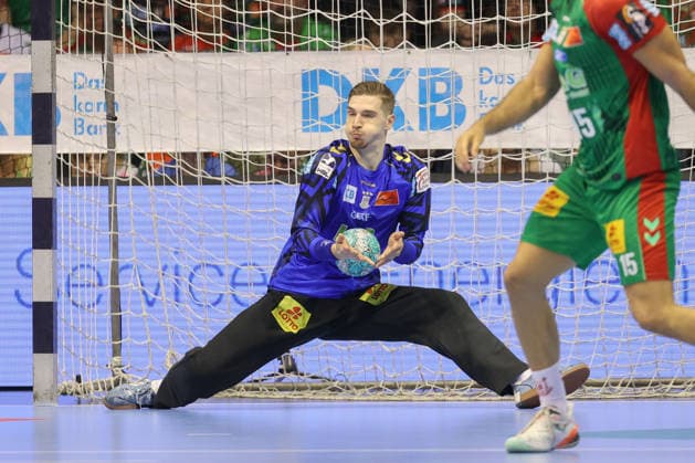 October 4, 2026, xtgx, Opel HBL Handball, SC Magdeburg vs. HC Erlangen emspor, from left: Dominik Kuzmanovic (Magdeburg), 1 save, blocks the ball, catches the ball, saves the shot (Magdeburg)