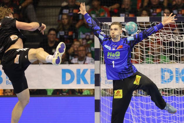 October 4, 2026, xtgx, Opel HBL Handball, SC Magdeburg vs. HC Erlangen emspor, from left: Dominik Kuzmanovic (Magdeburg), 1 save, blocks the ball, catches the ball, saves the shot (Magdeburg)